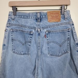 Vintage Levi's 550s size 14 mom jeans faded blue high rise straight leg